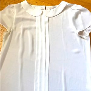 Short sleeve blouse.